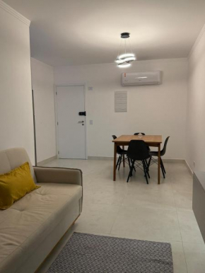 Apartamento novo pé na areia vista mar